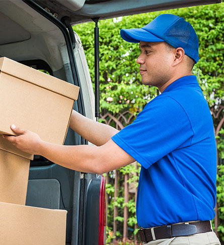 Man Unloading a Truck